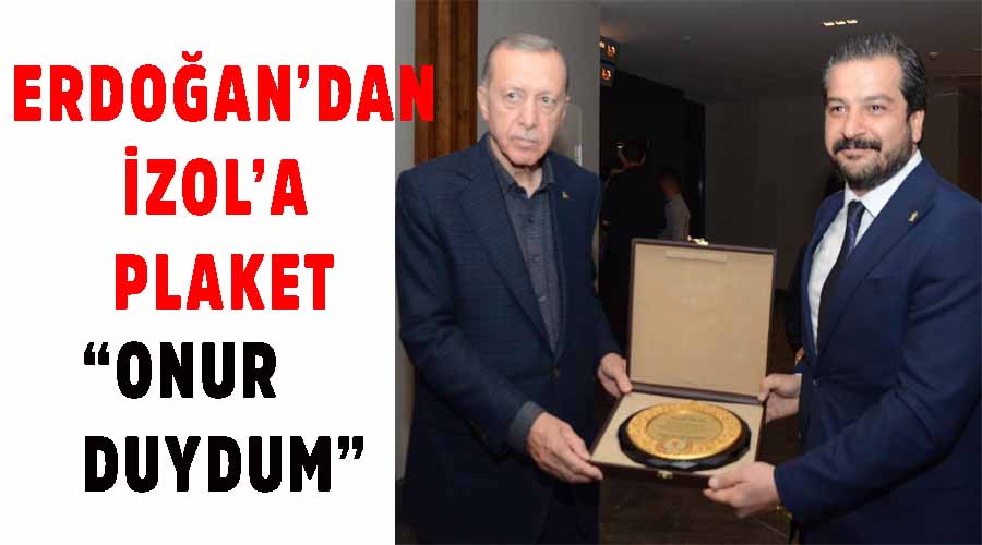 Erdoğan’dan genç siyasetçi plaket